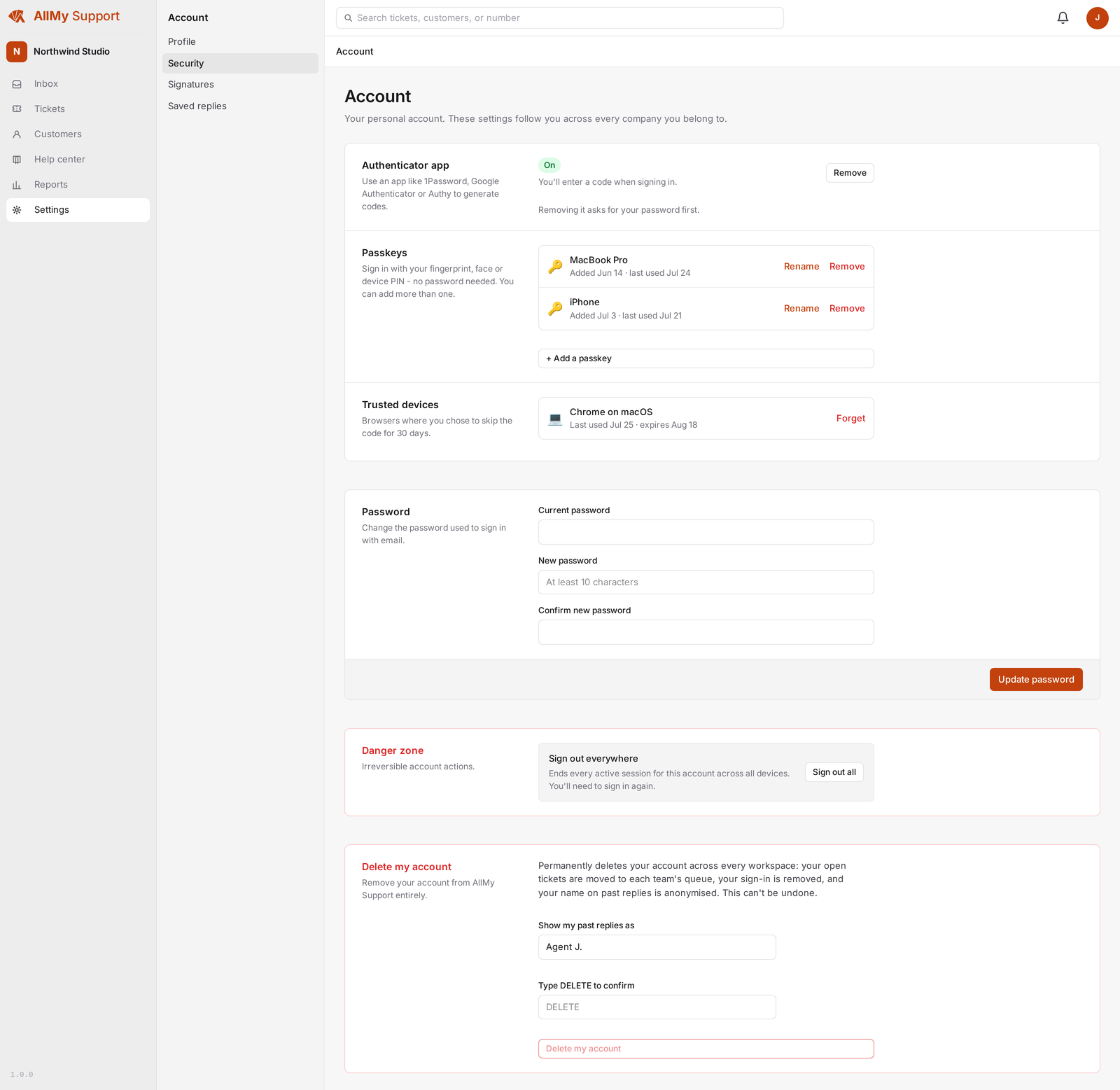The account security settings in AllMy Support: an authenticator app switched on, two registered passkeys, and a trusted device listed.