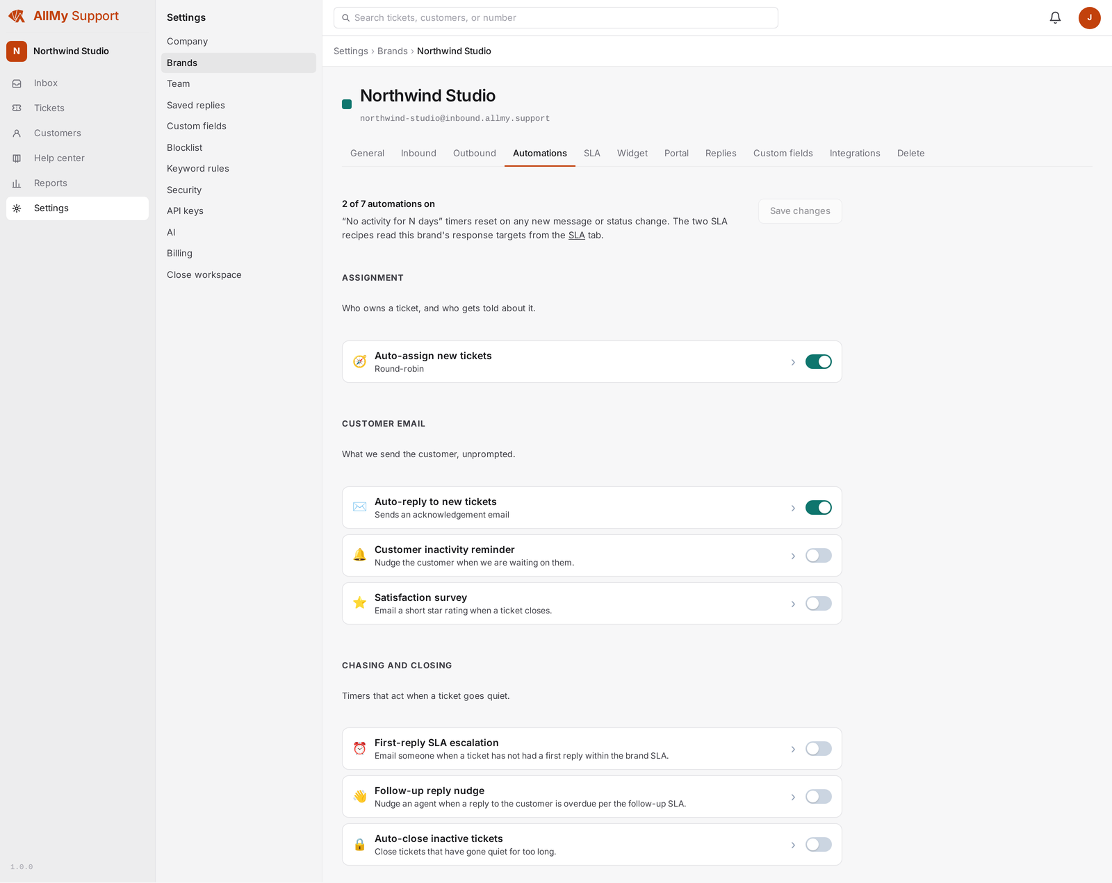 A brand's automations settings with auto-reply to new tickets and round-robin auto-assign turned on.